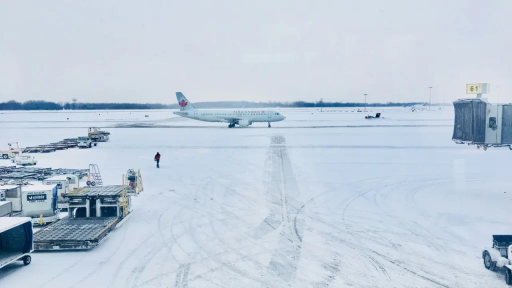 plane flying in snow